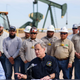 Drill, baby, drill. Texas Governor Greg Abbott, center, speaks during a press conference in the Permian Basin related to his re-election campaign Tuesday, Feb. 1, 2022, in Midland, Texas.